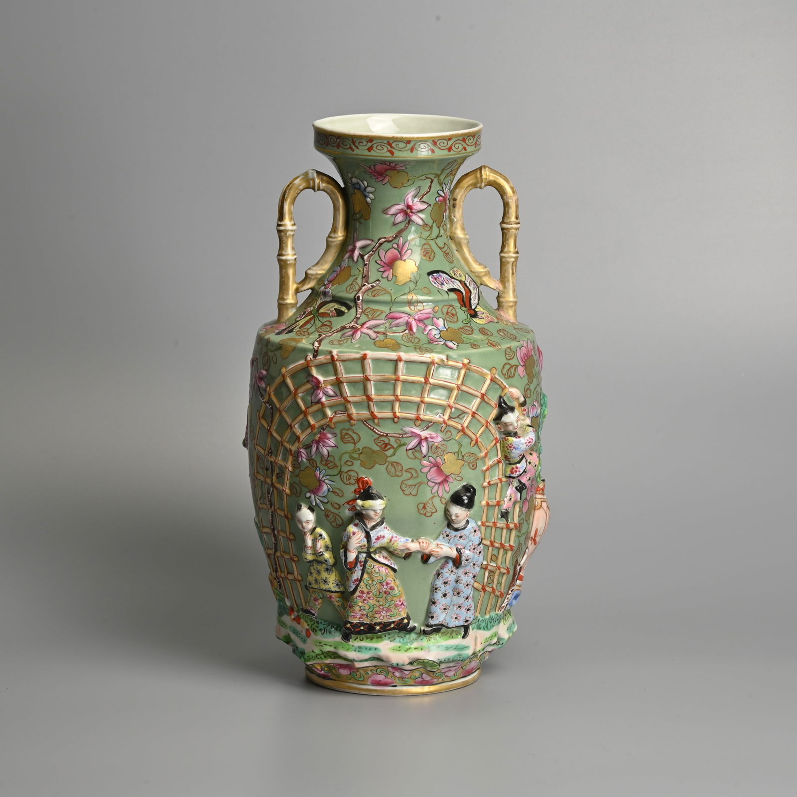 A CHINESE CANTON CELADON GROUND FAMILLE ROSE MOULDED PORCELAIN VASE, QING / REPUBLIC PERIOD. (1 of 8)