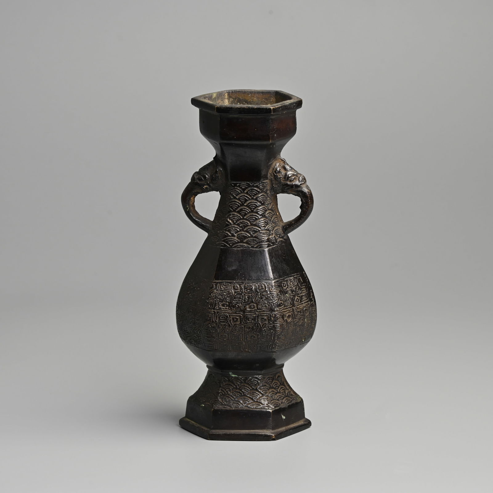 A CHINESE HEXAGONAL PEAR SHAPED BRONZE VASE, 17/18TH CENTURY. (1 of 10)