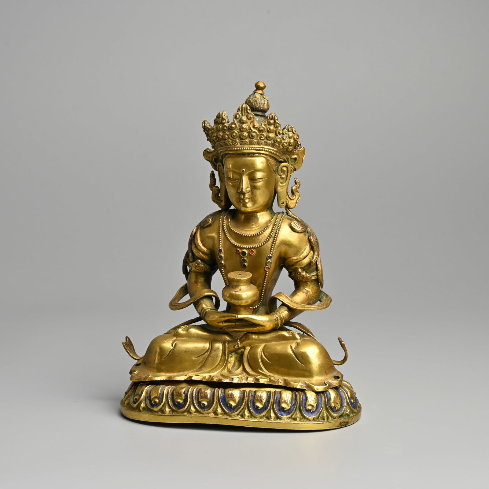 A SINO TIBETAN GILT COPPER ALLOY FIGURE OF AMITAYUS, 18TH CENTURY. (1 of 10)
