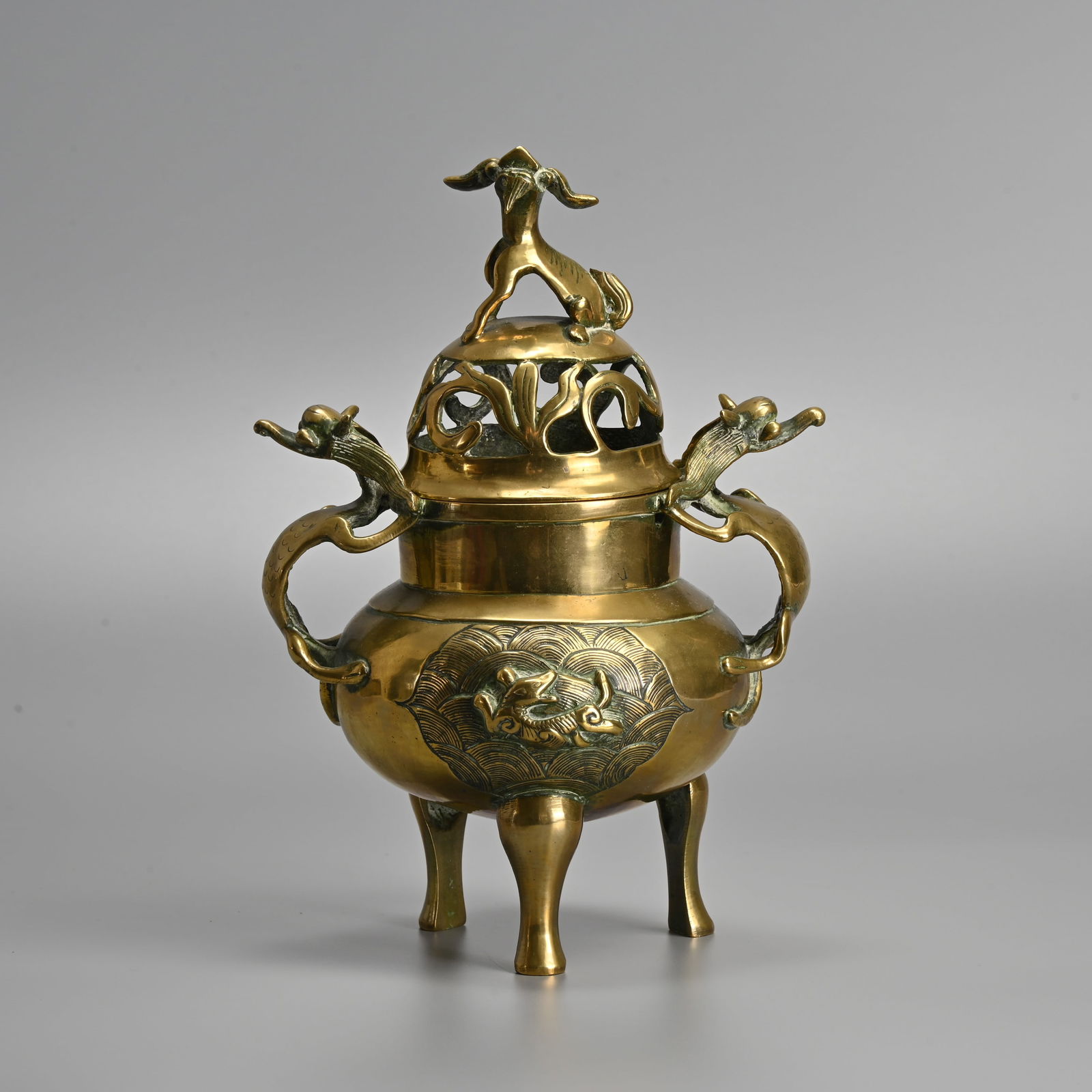 A CHINESE POLISHED BRONZE TRIPOD CENSER, EARLY 20TH CENTURY. (1 of 9)