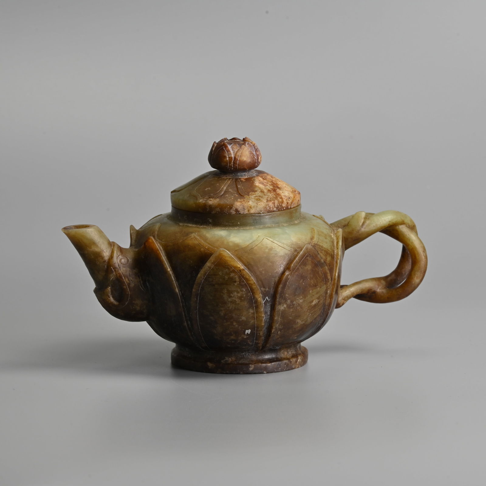 A CHINESE CARVED CELADON JADE 'LOTUS' TEAPOT WITH COVER. (1 of 9)