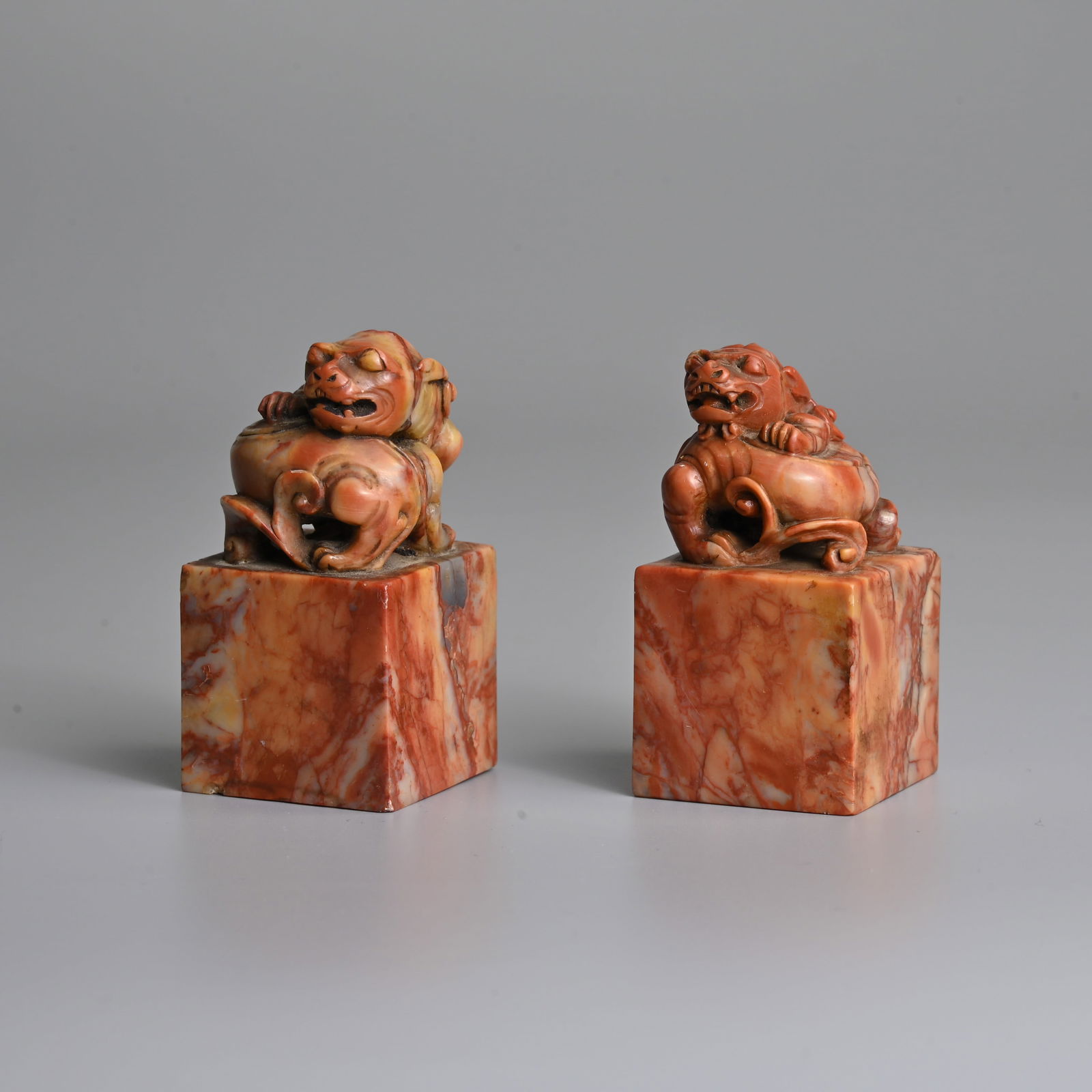 A PAIR OF CHINESE CARVED SOAPSTONE 'MYTHICAL BEAST' SEALS, 19/20TH CENTURY. (1 of 7)