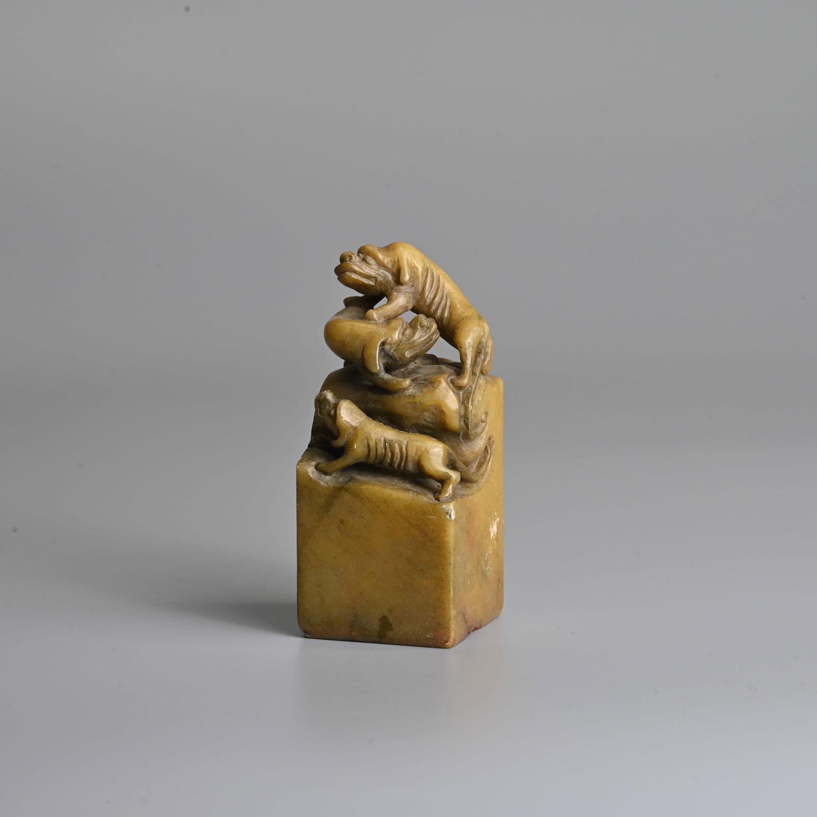 A TALL CHINESE CARVED SOAPSTONE 'LION GROUP' SEAL, 19/20TH CENTURY. (1 of 9)