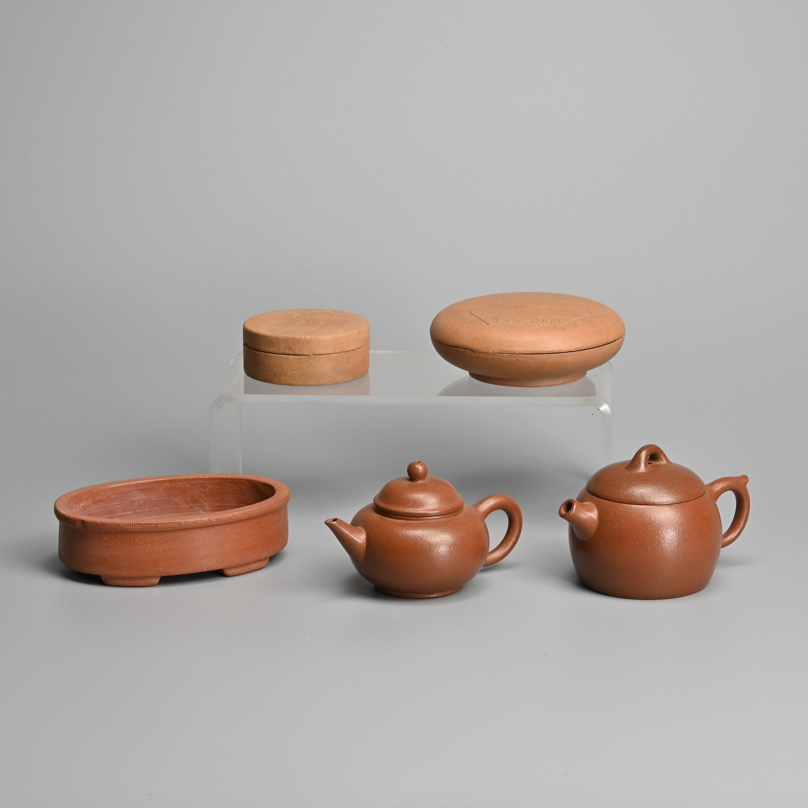 A GROUP OF CHINESE YIXING POTTERY TEA WARES AND INK BOXES, 20TH CENTURY. (1 of 20)