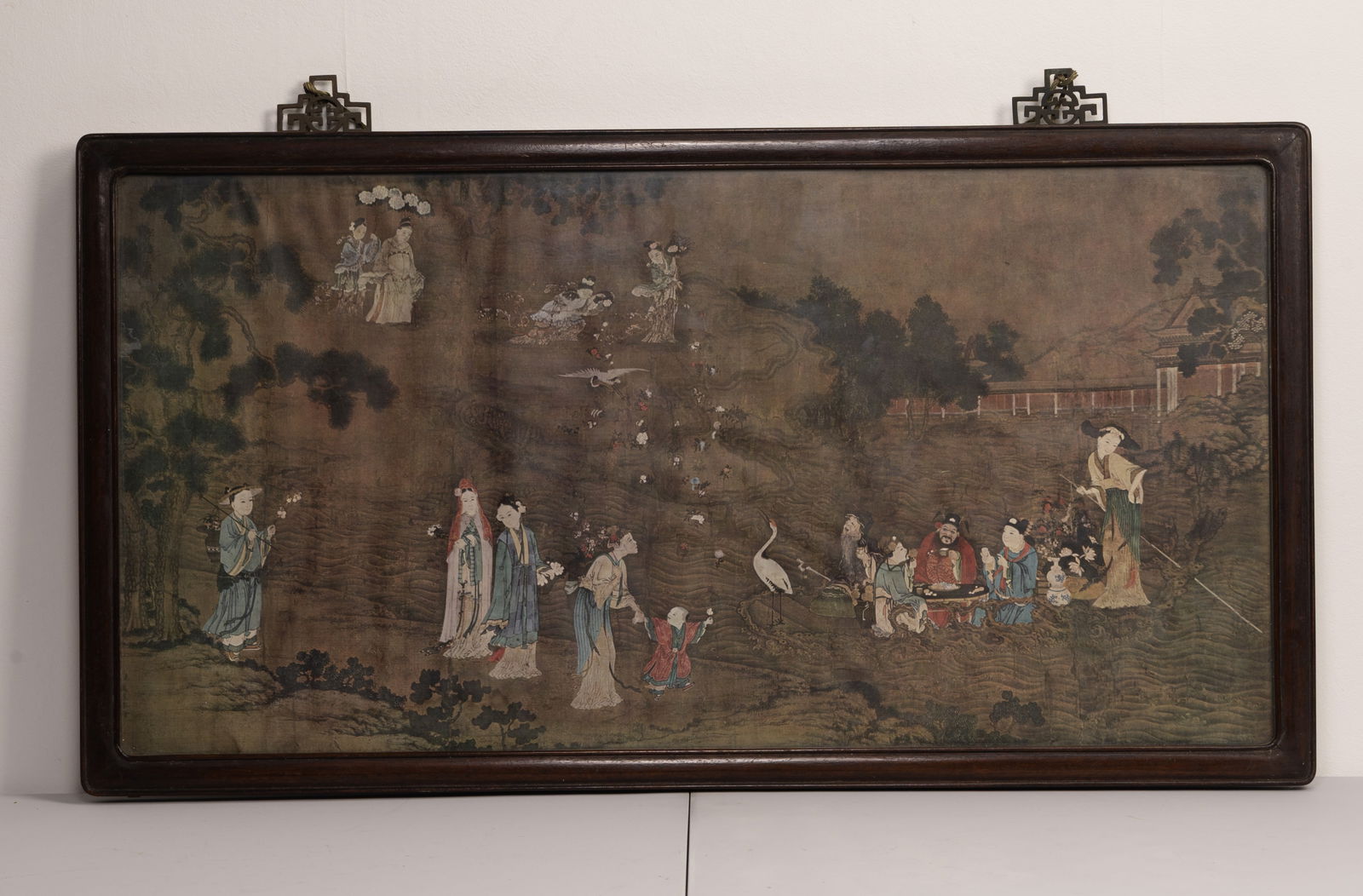 A CHINESE 19/20TH CENTURY HARDWOOD FRAME WITH LATER PRINT.: A CHINESE 19/20TH CENTURY HARDWOOD FRAME WITH LATER PRINT. The frame of rectangular form with metal mounts, enclosing a print of a Ming dynasty artwork known as 'The Earthly Paradise'. Framed and glaz