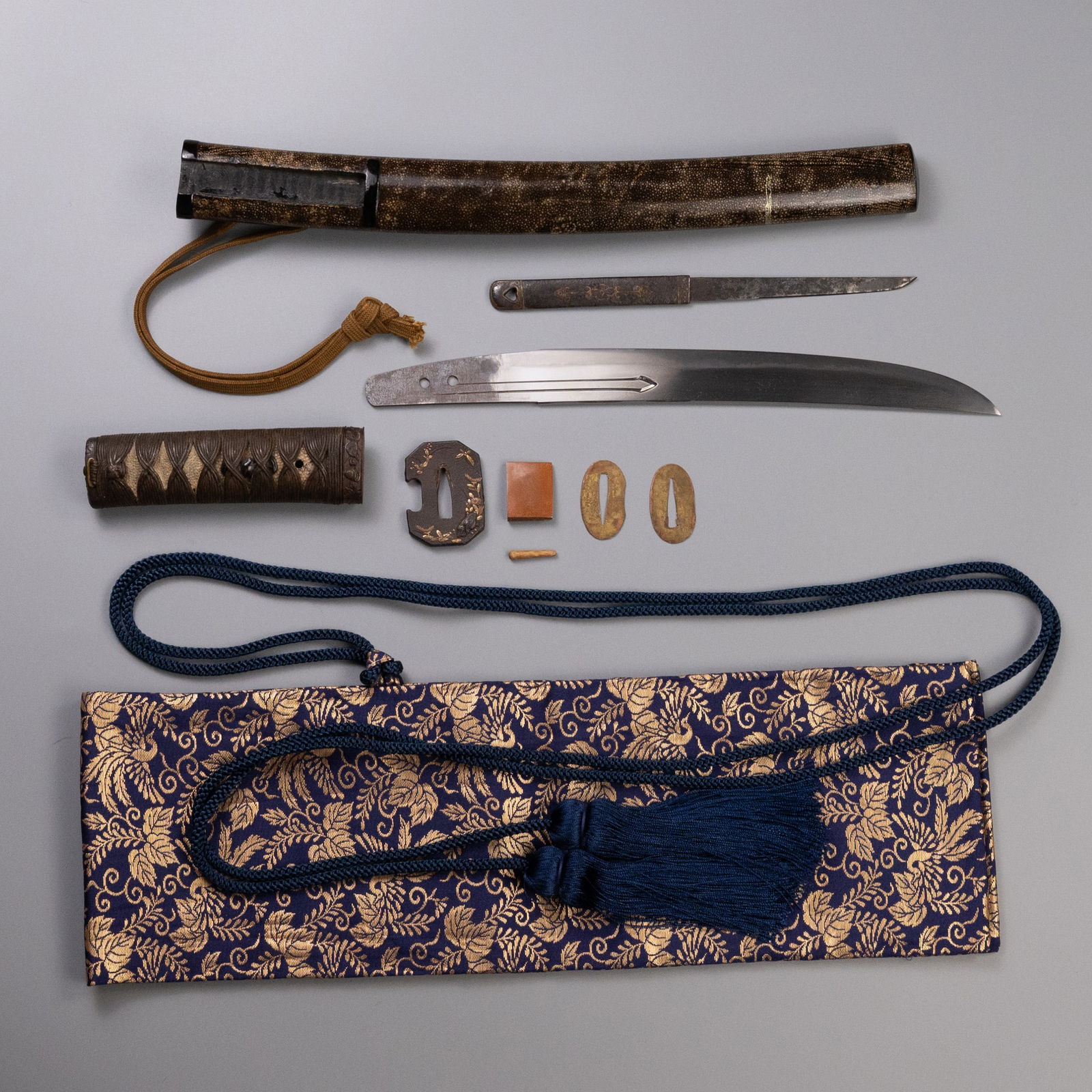 A JAPANESE EDO PERIOD TANTO, A KOGATANA AND LACQUERED SCABBARD WITH EARLIER NAMBOKUCHO BLADE.: A JAPANESE EDO PERIOD TANTO, A KOGATANA AND LACQUERED SCABBARD WITH EARLIER NAMBOKUCHO BLADE. With unsigned 'mumei' blade, Sugata: Enbun-Joji, with octagonal tsuba decorated with a frog, insects and f