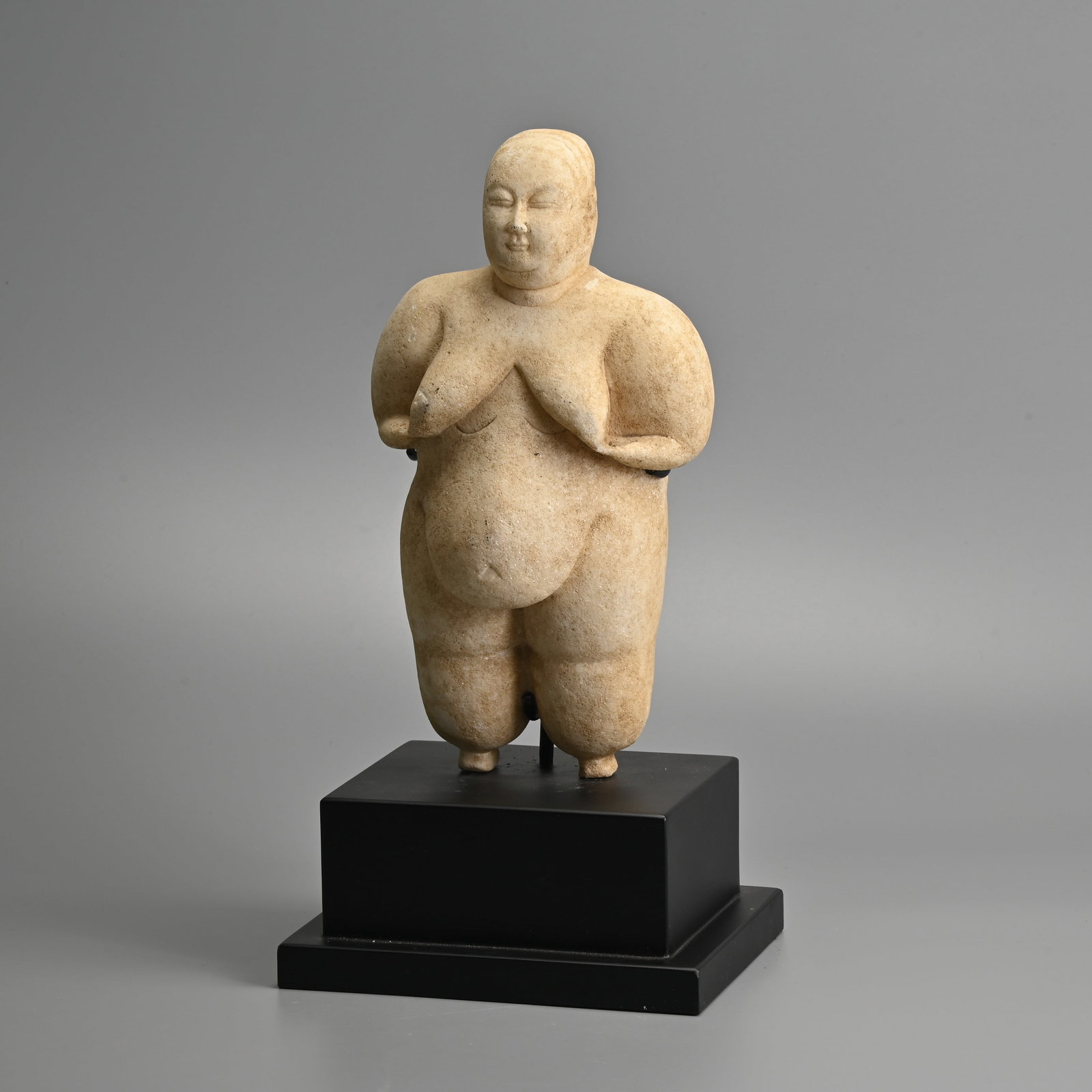 A CARVED WHITE MARBLE STONE FIGURE OF A CATALHOYUK WOMAN OR FERTILITY GODDESS, TURKEY, NEOLITHIC (1 of 9)