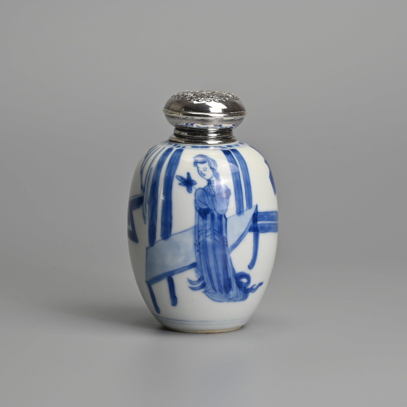 A CHINESE BLUE AND WHITE 'LONG ELIZA' PORCELAIN JAR WITH WHITE METAL MOUNTS AND COVER, KANGXI PERIOD: A CHINESE BLUE AND WHITE 'LONG ELIZA' PORCELAIN JAR WITH WHITE METAL MOUNTS AND COVER, KANGXI PERIOD (1662-1722). Of ovoid form decorated with two elegant ladies dressed in robes beside a table. With 
