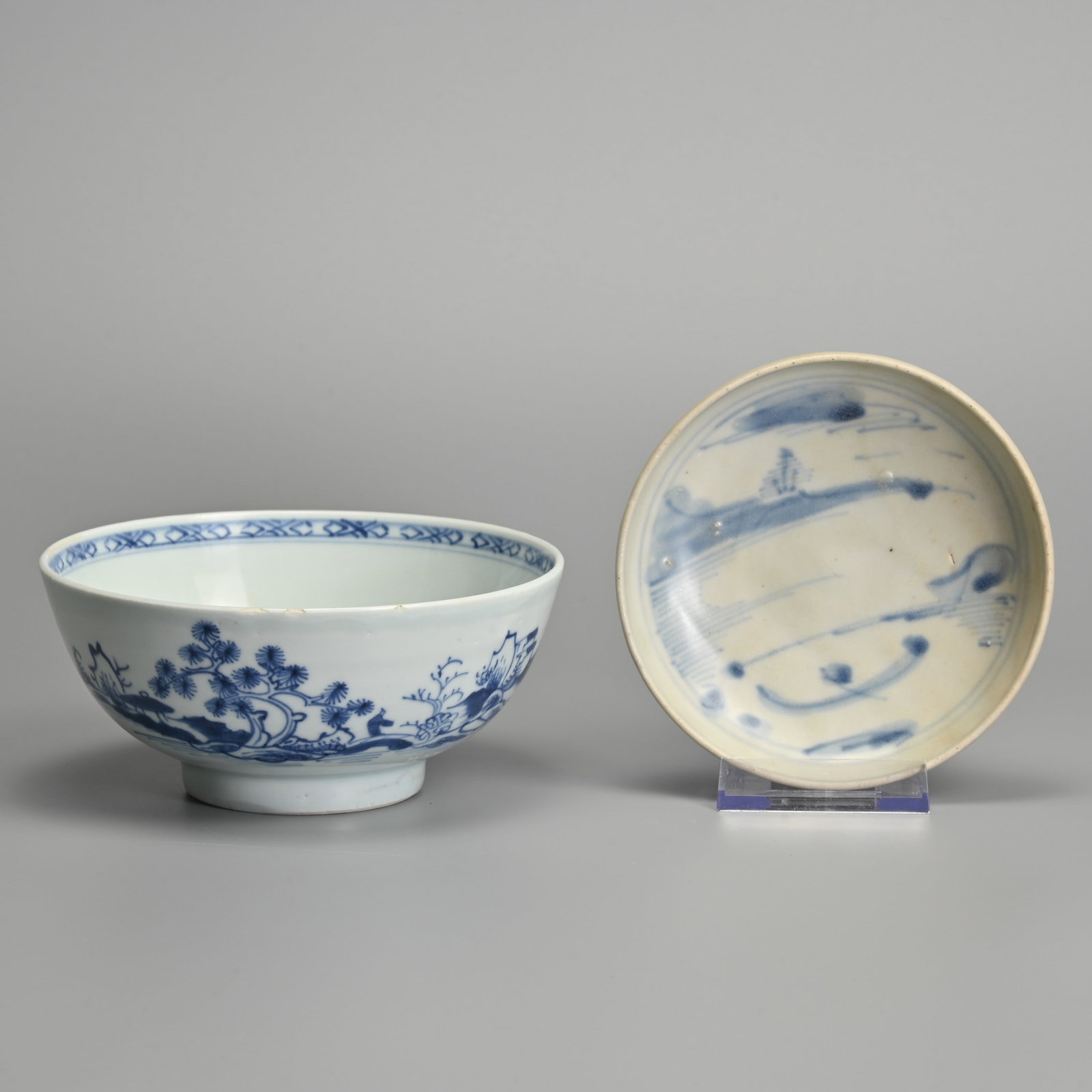 VUNG TAU AND NANKING CARGO BLUE AND WHITE CHINESE PORCELAIN BOWL AND SAUCER DISH, 17/18TH CENTURY,: VUNG TAU AND NANKING CARGO BLUE AND WHITE CHINESE PORCELAIN BOWL AND SAUCER DISH, 17/18TH CENTURY, EX. CHRISTIE'S. The dish decorated with coastal scene, Lot 894 Christie's label to base. The bowl dec