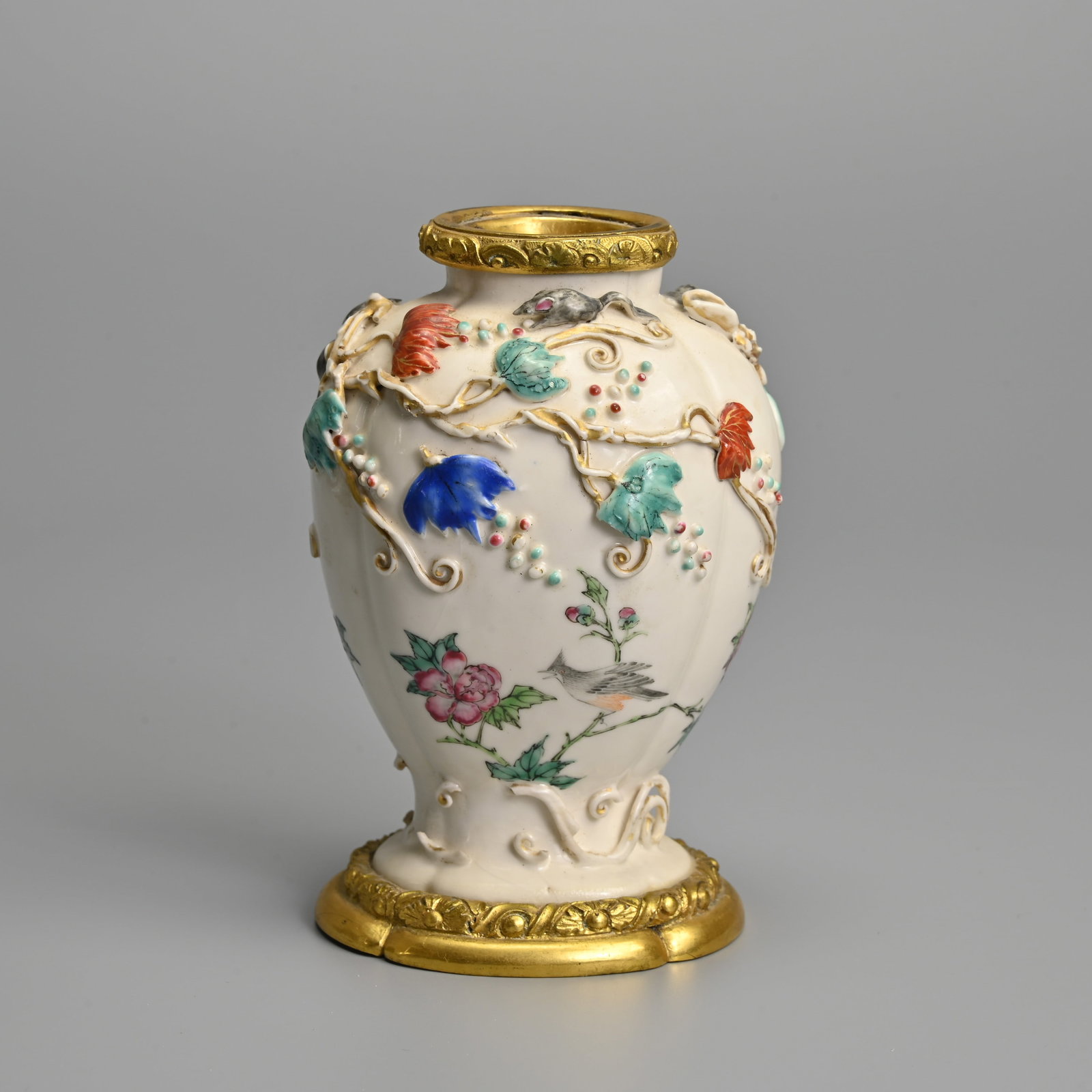 A CHINESE MOULDED FAMILLE ROSE LOBED PORCELAIN JAR WITH GILT METAL MOUNTS, YONGZHENG / QIANLONG, (1 of 6)