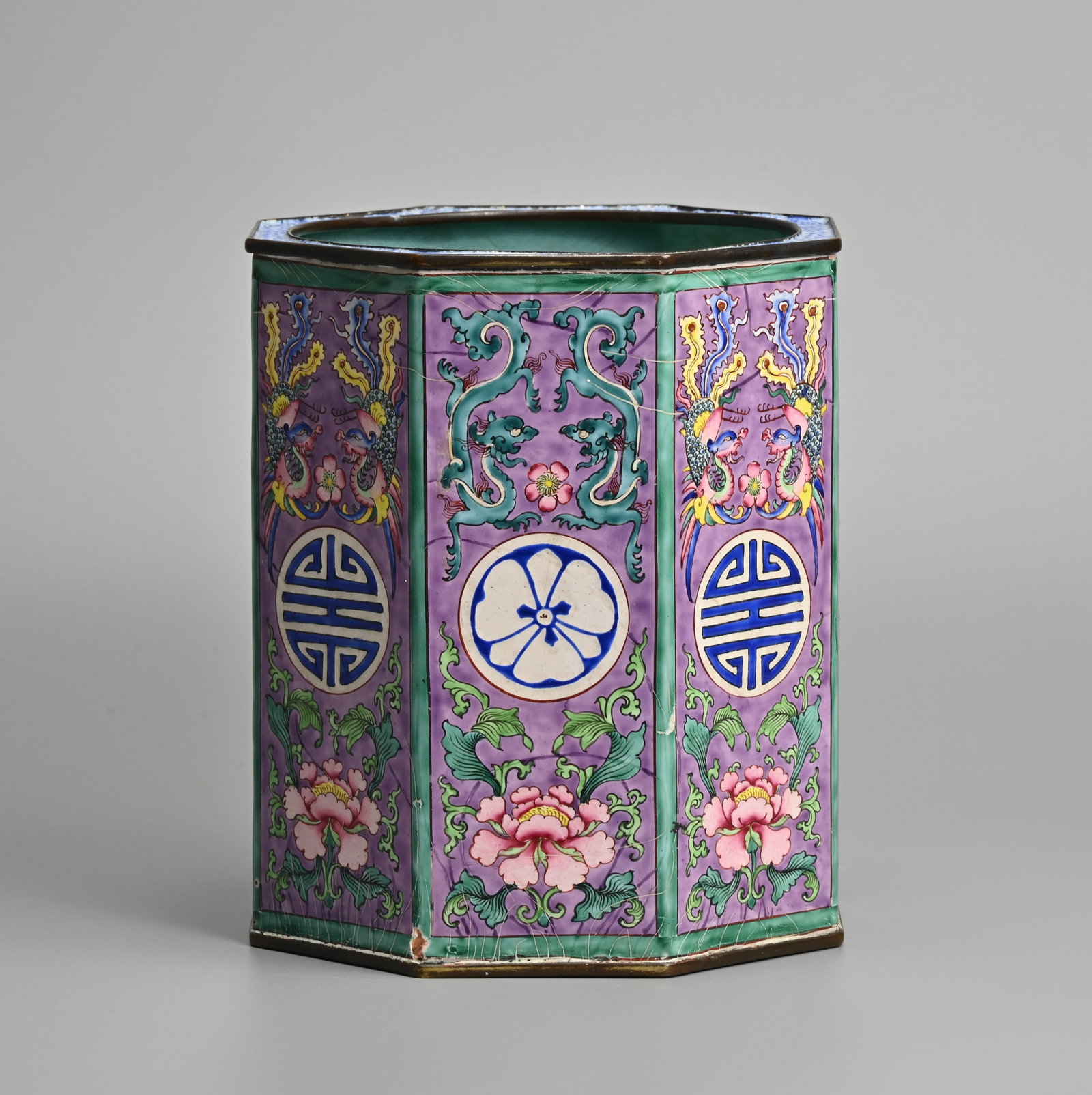 A CHINESE CANTON ENAMEL OCTAGONAL BRUSH WASHER, BITONG, 19TH CENTURY.: A CHINESE CANTON ENAMEL OCTAGONAL BRUSH WASHER, BITONG, 19TH CENTURY. Enamel on copper, each panel decorated with alternating dragons, phoenix shou roundels and flowers heads above peony flower heads 