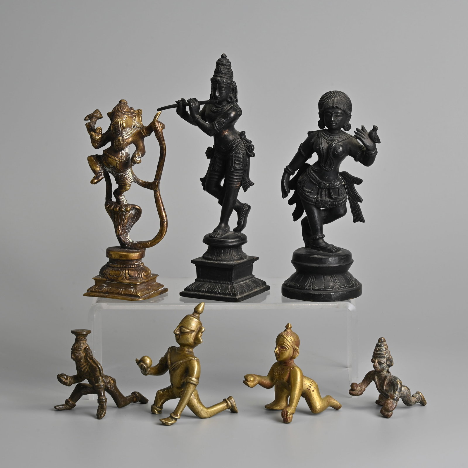 A GROUP OF INDIAN BRONZE BRASS HINDU FIGURES OF DEITIES, 19/20TH CENTURY. (1 of 12)