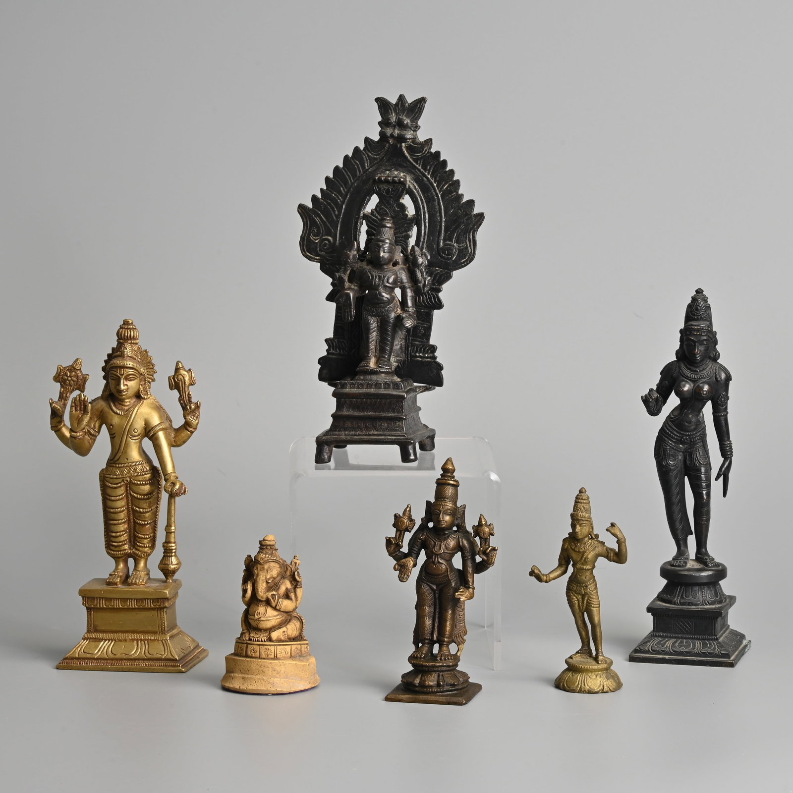 A GROUP OF INDIAN BRASS BRONZE FIGURES OF HINDU DEITIES, VISHNU AND PARVATI, 19/20TH CENTURY. (1 of 13)