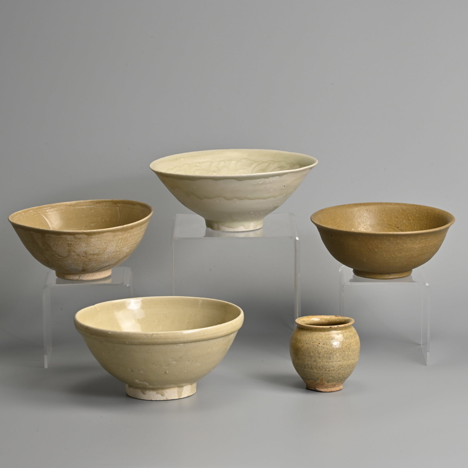 A GROUP OF CHINESE LONGQUAN CELADON AND QINGBAI WARE BOWLS AND JAR, CIRCA 13TH CENTURY. (1 of 20)