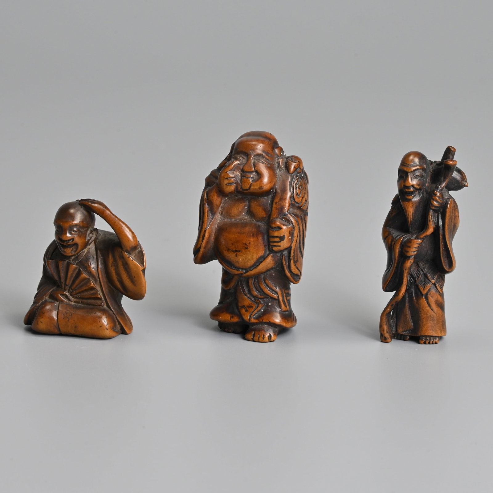 THREE JAPANESE CARVED BOXWOOD NETSUKE, UNSIGNED, MEIJI PERIDO. (1 of 6)