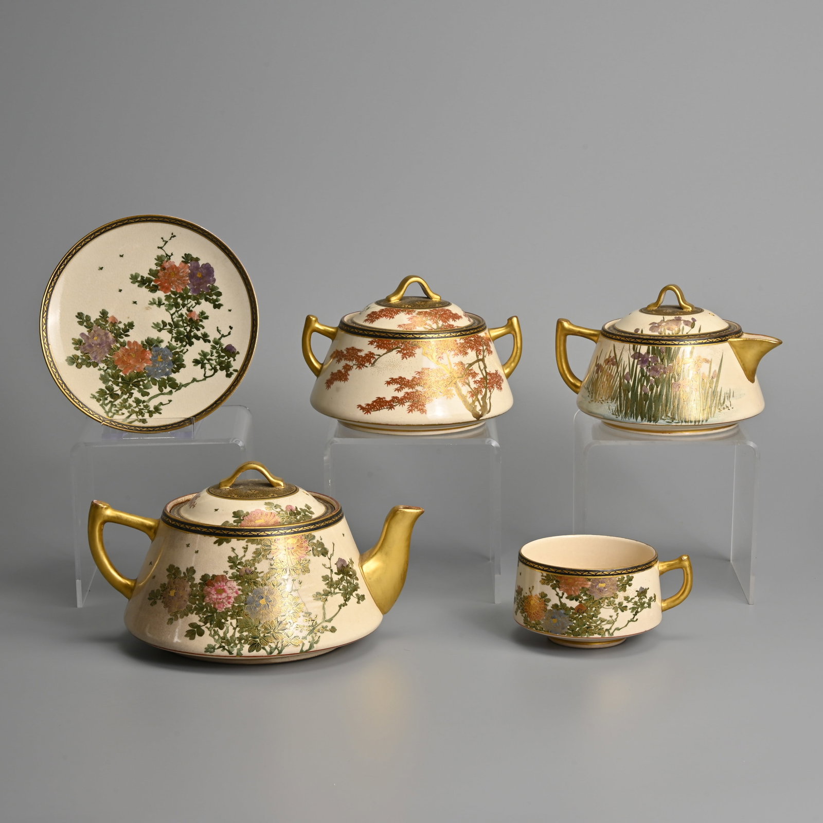 A JAPANESE SATSUMA WARE TEA SET, IZUMIYAMA, LATE MEIJI PERIOD. (1 of 19)