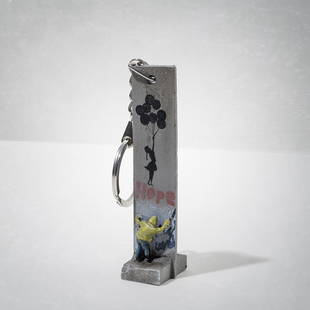 Banksy (British 1974 -), 'Walled Off Hotel - Key Fob: Banksy (British 1974 -), 'Walled Off Hotel - Key Fob Wall Section (Girl With Balloons)', hand-painted resin sculpture; 9cm tall inc base ARR