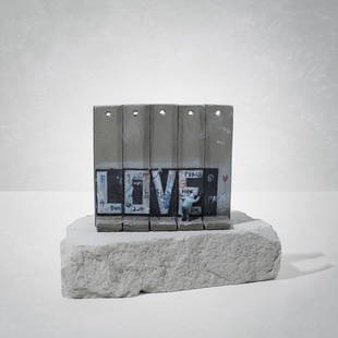 Banksy (British 1974-), 'Walled Off Hotel - Love': Banksy (British 1974-), 'Walled Off Hotel - Love', five-part Souvenir Wall Section, hand-painted resin sculpture with West Bank Separation Wall base; 11.5cm tall inc base ARR