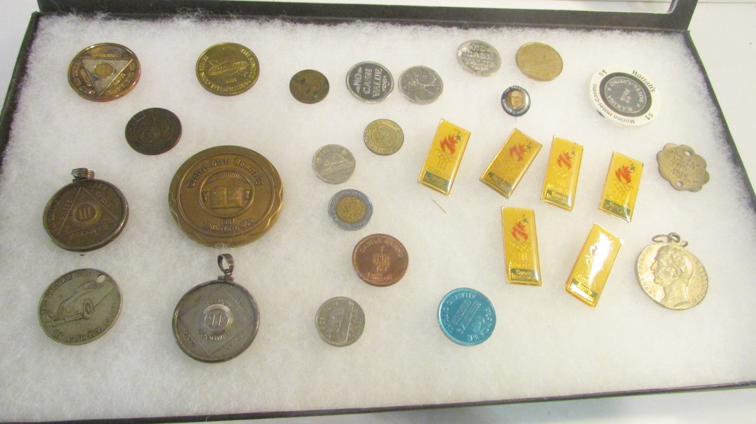 Lot of Vintage Tokens Pres Harding Olympic etc.: Check the photos for all of the tokens that are in this lot. Includes AA, central state U. 100 years, Harding for President button, Olympics, etc.