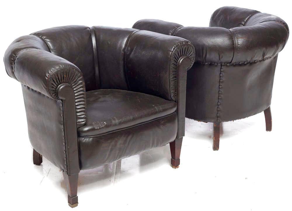 Pair of retro leather-upholstered club chairs: Condition: upholstery torn on side of chair 29" tall x 34" wide