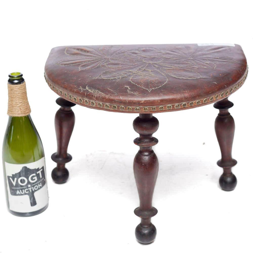 Rustic tooled leather footstool: 12" tall x 16" wide