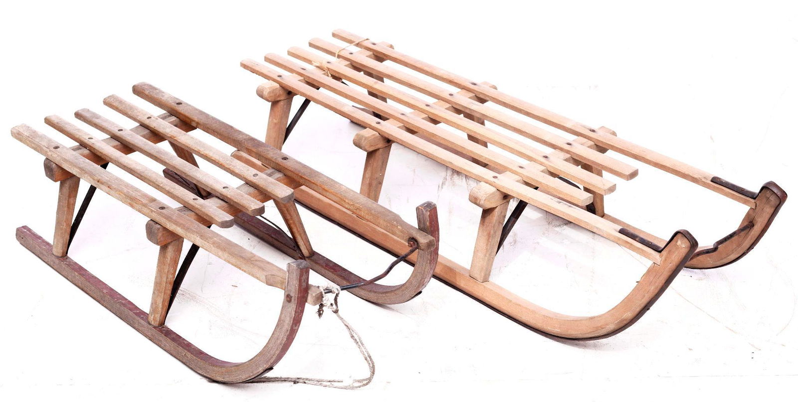 Pair of primitive pine sleds (1 of 2)