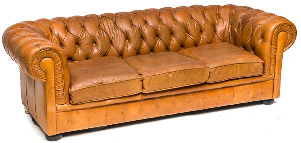 Chesterfield-style leather upholstered sofa: 28" tall x 92" long