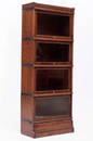 Oak sectional glass-front bookcase by The