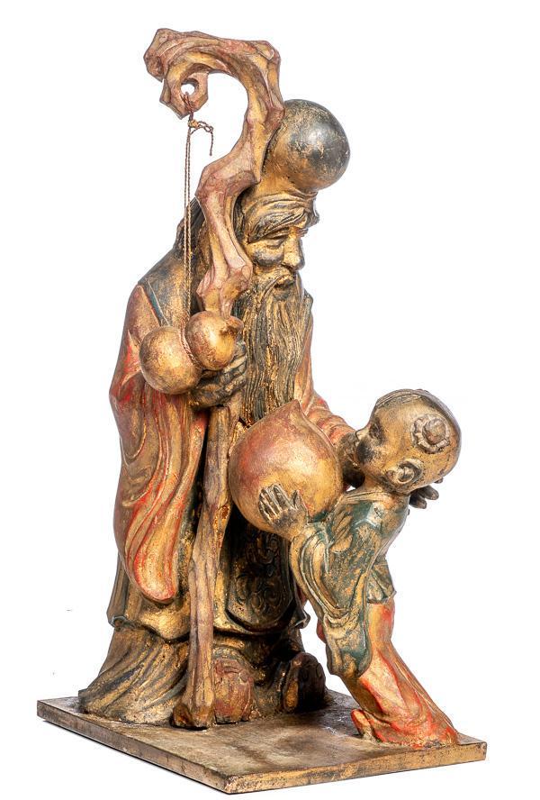 Carved Asian-style carved wooden statuette: 35" tall x 14" wide x 18.5" deep Provenance: The Estate of Danny Spear/Land of Was Antiques