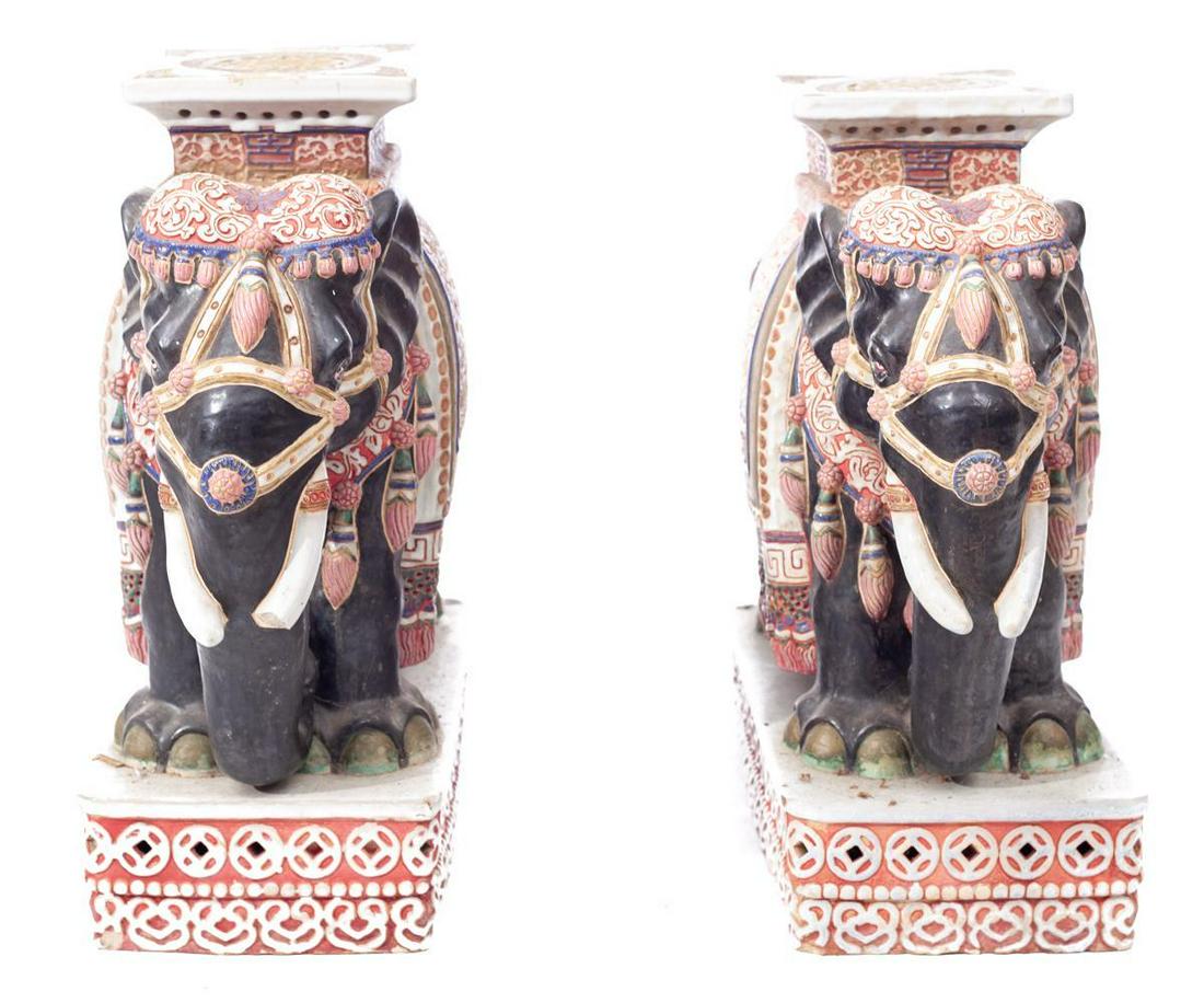 Pair of Decorative Porcelain Elephant Plant Stands: Condition: Damage to tusk 21" tall x 22" long x 10" wide