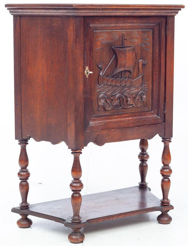 Carved Oak Cabinet with Viking Scene, circa 1920: With key 40.5" tall x 33" wide x 15.5" deep