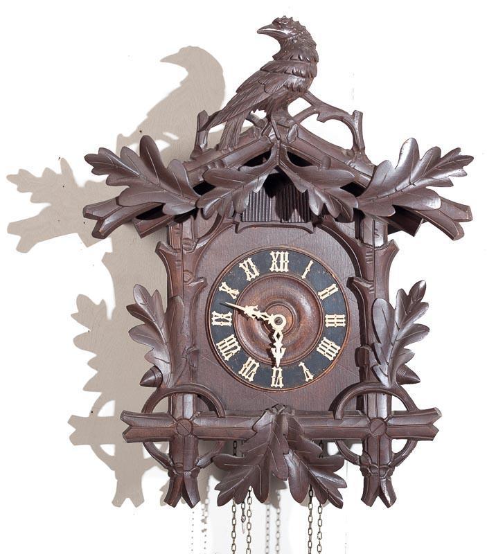 Cuckoo and Quail Wall Clock with Brass Plate Movement: 21" tall x 16" wide Provenance: The Estate of Andy and Bea Copeland Note: This antique clock is sold "where-is, as-is" and Vogt Auction makes no guarantee as to the working order or completeness of th