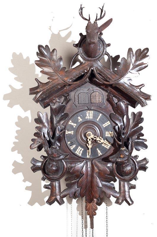 Cuckoo and Quail Wall Clock with Brass Movement: Condition: Repaired damage to frame and accents; broken ear on deer 24" tall x 15" wide Provenance: The Estate of Andy and Bea Copeland Note: This antique clock is sold "where-is, as-is" and Vogt Auct