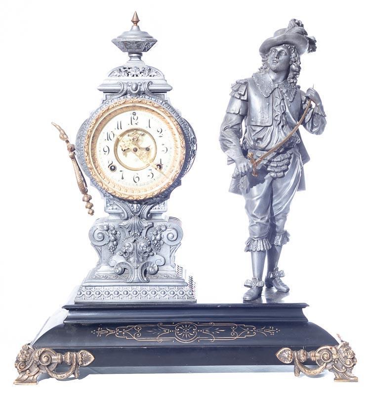 Ansonia, Figure Mantle Clock: 21.5" tall x 19.5" wide x 9" deep Provenance: The Estate of Andy and Bea Copeland Note: This antique clock is sold "where-is, as-is" and Vogt Auction makes no guarantee as to the working order or comp