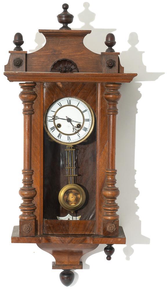 Junghans 8 Day Time & Strike Wall Clock: Reproduction top; missing one lower finial 33" tall x 10.5" wide Provenance: The Estate of Andy and Bea Copeland Note: This antique clock is sold "where-is, as-is" and Vogt Auction makes no guar