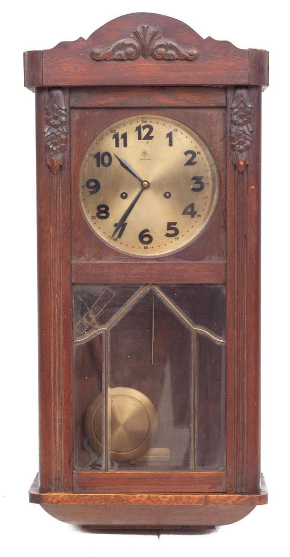 Wall Hanging Junghans Regulator Clock, circa 1920: Condition: Broken glass 30" tall x 12.5" wide Note: This antique clock is sold "where-is, as-is" and Vogt Auction makes no guarantee as to the working order or completeness of this item. Conditions ar