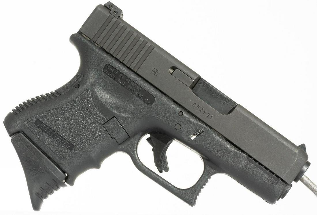 Glock 27 .40 Semi-Automatic Pistol: Serial: BPZ985US Manufacturer: Glock Model: 27 Caliber: .40 S&W Barrel length: 3.5" Condition: Good 2 extra magazines and cleaning tools Provenance: The Estate of Dr. Thomas Romo, Jr. (San Antonio, Te