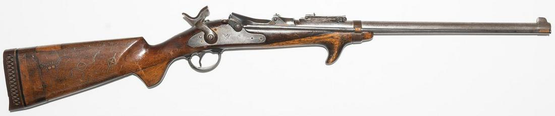 Springfield Model 1884 Trap Door: Serial: 389346 Manufacturer: Springfield Model: Model 1884 Trap Door Caliber: .45-70 Barrel length: Condition: fair Sporterized with native American type embellishment Provenance: A Waco, Texas 