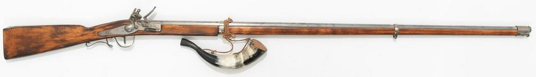 Belgian Flintlock Springfield Style Black Powder Rifle: Serial: 138 Manufacturer:Belgian Model: Springfield Style Flintlock Caliber: approx. .50 cal Barrel length: Condition: fair; with powder horn Provenance: A Waco, Texas Estate ALL firearms and ammuniti