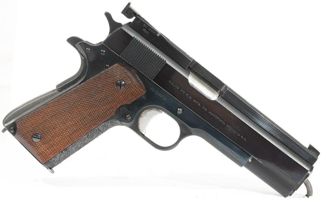 Colt 1911 Government .45 Semi-Automatic Pistol: Serial: 394714 Manufacturer: Colt Model: 1911 Government Caliber: .45 Barrel length: 5" Condition: Good Target gun conversion Bo-Mar Sight US Property marked Frame 7 extra magazines Provenance: The Es