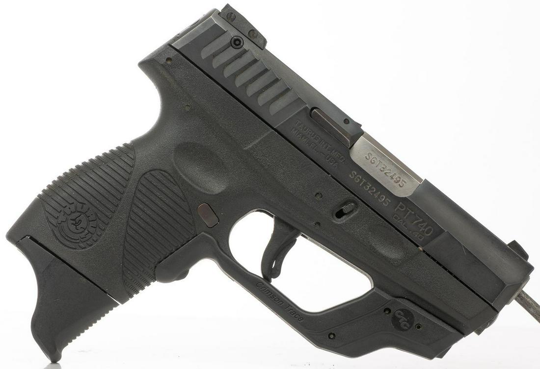 Taurus PT740 Slim Pistol: Serial: SGT32495 Manufacturer: Taurus Model: PT740 Caliber: .40 S&W Barrel length: Condition: Good CTC Crimson Grace Laser Grip Provenance: An Alamo Heights, Texas Estate ALL firearms and ammunition w