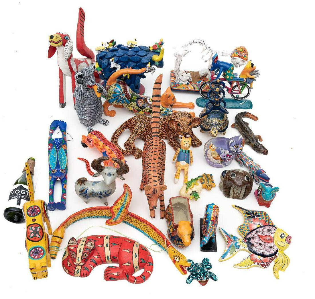 Lot of 26 Mexican Folk Art Alebrijes: Provenance: The Estate of Drs. Frank and Barbara Pino of San Antonio, TX 15" tall x 22" long/ Largest Includes various sizes, colors, shapes, materials Please note: All the Mexican folk art piec