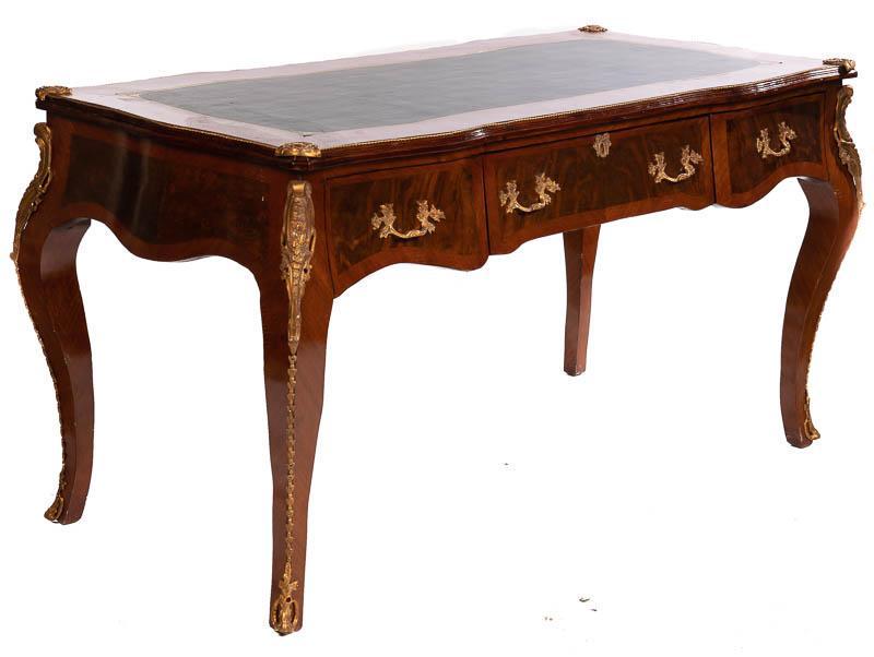 Leather Top Ormolu Desk: French Empire-style, cabriole legs, gilt accents, 3-drawers 33" tall x 62.5" wide x 30.5" deep State-wide delivery is available for this item. Please email shipping@vogtauction.com or call 210-822-615