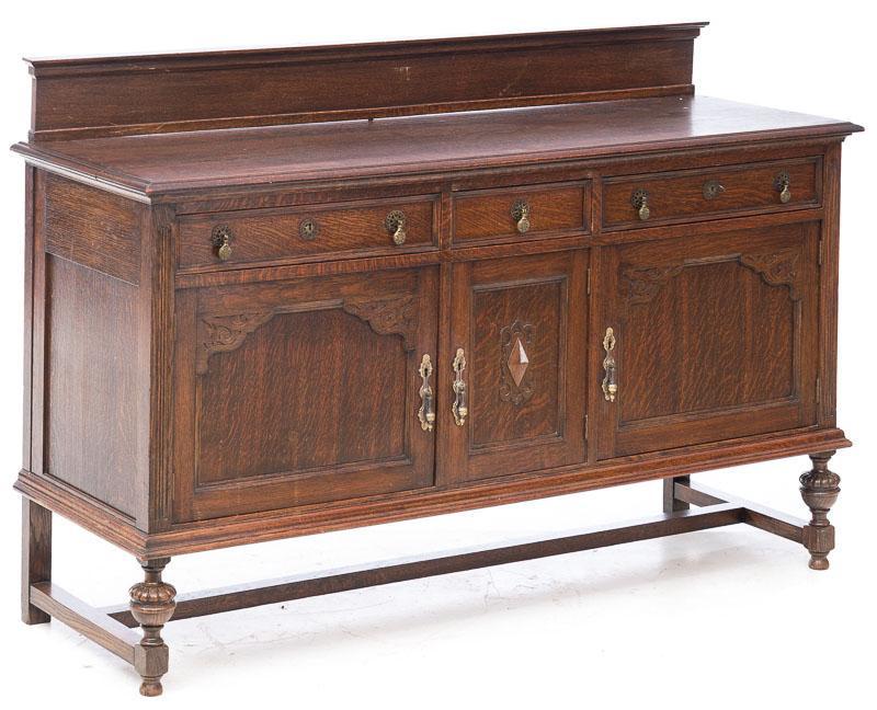 Sideboard: French Provincial-style, metal drawer pulls, carved accents on top, turned and cross stretched legs, 3-drawers, 4-doors, drawers are sectioned, includes key 43" tall x 65.5" wide x 21.5" deep Conditio