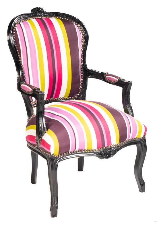 Bergere Armchair: Multi-colored upholstery, black painted wooden base, cabriole legs, stud accents 36" tall x 22" wide x 18" deep State-wide delivery is available for this item. Please email shipping@vogtauction.com or