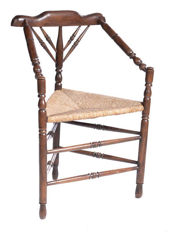 Corner Chair: French Provincial-style, turned wooden legs, cord seat 33" tall x 19" wide x 15" deep State-wide delivery is available for this item. Please email shipping@vogtauction.com or call 210-822-6155 for a q