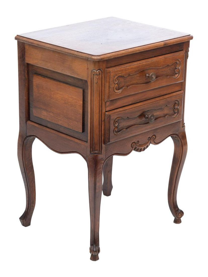 Nightstand: Louis XV-style, circa 1890, carved accents, metal drawer pulls, 2-drawers, cabriole legs 26.5" tall x 18" wide x 14.5" deep State-wide delivery is available for this item. Please email shipping@vogtau