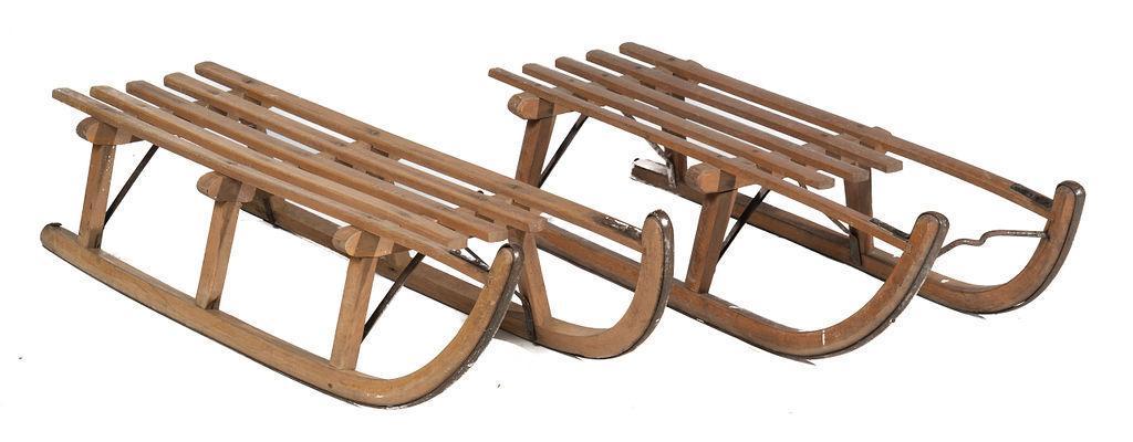 Pair of Rustic Sleds: Pair of rustic wooden sleds, circa 1910 9” tall x 43” long x 15” wide/ Largest State-wide delivery is available for this item. Please email shipping@vogtauction.com or call 210-822-6