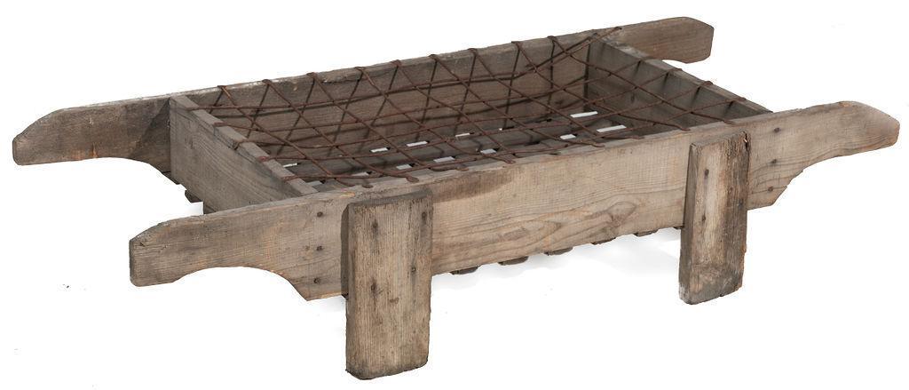 Wooden Bottle Holder: Wooden and metal, circa 1890, dual handled 13.5” tall x 64” long x 26” wide State-wide delivery is available for this item. Please email shipping@vogtauction.com or call 210-822-6155