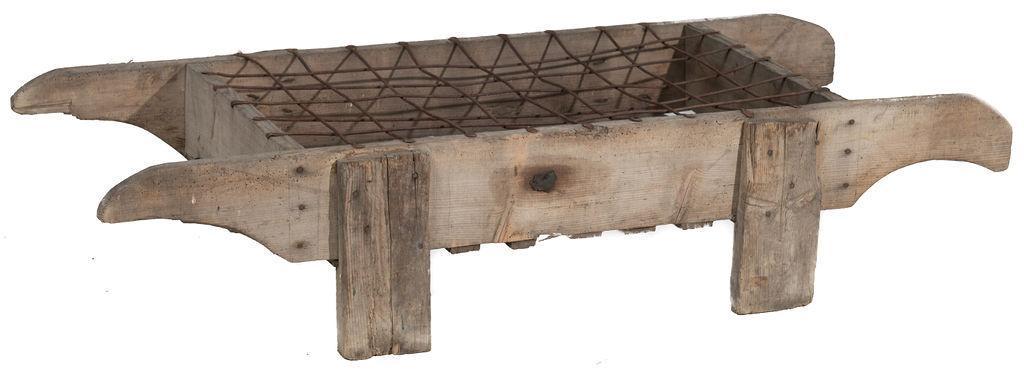 Wooden Bottle Holder: Wooden and metal, circa 1890, dual handled 13.5” tall x 64” long x 26” wide State-wide delivery is available for this item. Please email shipping@vogtauction.com or call 210-822-6155